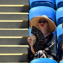Espectadores asisten al tercer día del torneo de tenis Open de Australia en Melbourne. | Foto:Paul Crock / AFP