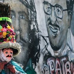 Una persona se prepara para bailar durante la Fiesta de San Sebastián, en Diriamba, Nicaragua. | Foto:Oswaldo Rivas / AFP