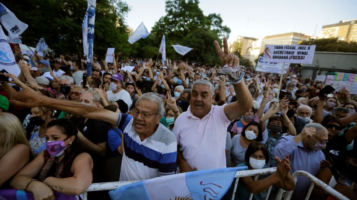 Demonstrators take part in a protest demanding the reform of the judicial system outside the Justice Palace in Buenos Aires, on February 1, 2022. 