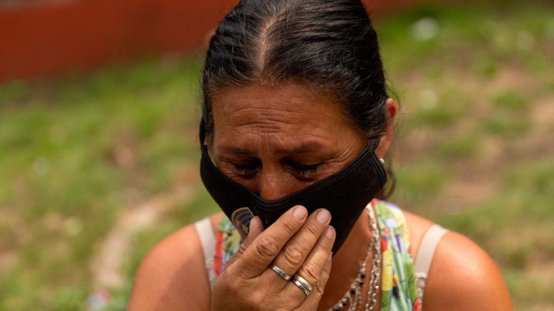 Sandra, mother of a 28-year-old who was admitted at the Bocalandro Hospital after being poisoned with cocaine, cries outside the building, in Loma Hermosa, Buenos Aires Province, Argentina on February 3, 2022. 
