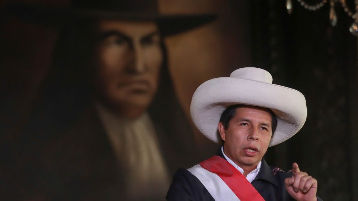 Hand out photo released by the Peruvian Presidency press office of President Pedro Castillo, announcing in a televised statement his decision to "reshuffle" his ministerial cabinet, which implies the departure of the repudiated new prime minister, Héctor Valer Pinto, whom it swore in just three days ago, in Lima on February 4, 2022. 