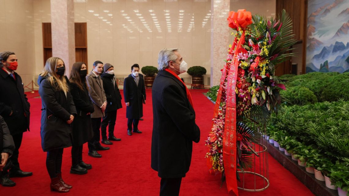Handout photo released by the Presidency shows President Alberto Fernández during a wreath laying ceremony at the former president of the People's Republic of China (1949-1976) Mao Zedong mausoleum in Beijing on February 5, 2022. 
