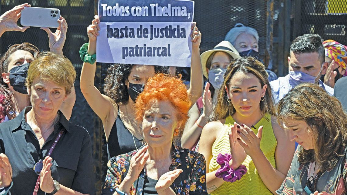 Protesters gather outside the Brazilian Consulate in Buenos Aires, Argentina, to demand justice in the rape trial involving actress Thelma Fardin (pictured in yellow) and actor Juan Dárthes.