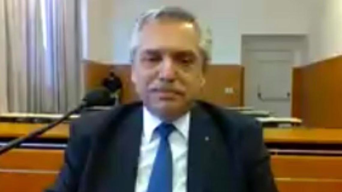 President Alberto Fernández gives testimony before the court, as pictured on a video stream.