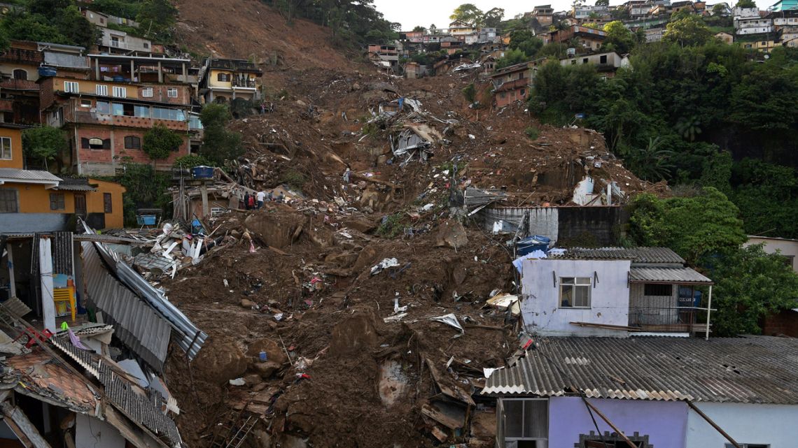 View after a mudslide in Petrópolis, Brazil on February 17, 2022 during the second day of rescue operations. Torrential rains and floods that hit the Brazilian city killed at least 104 people, officials reported Thursday, as the toll from the disaster continued to rise.