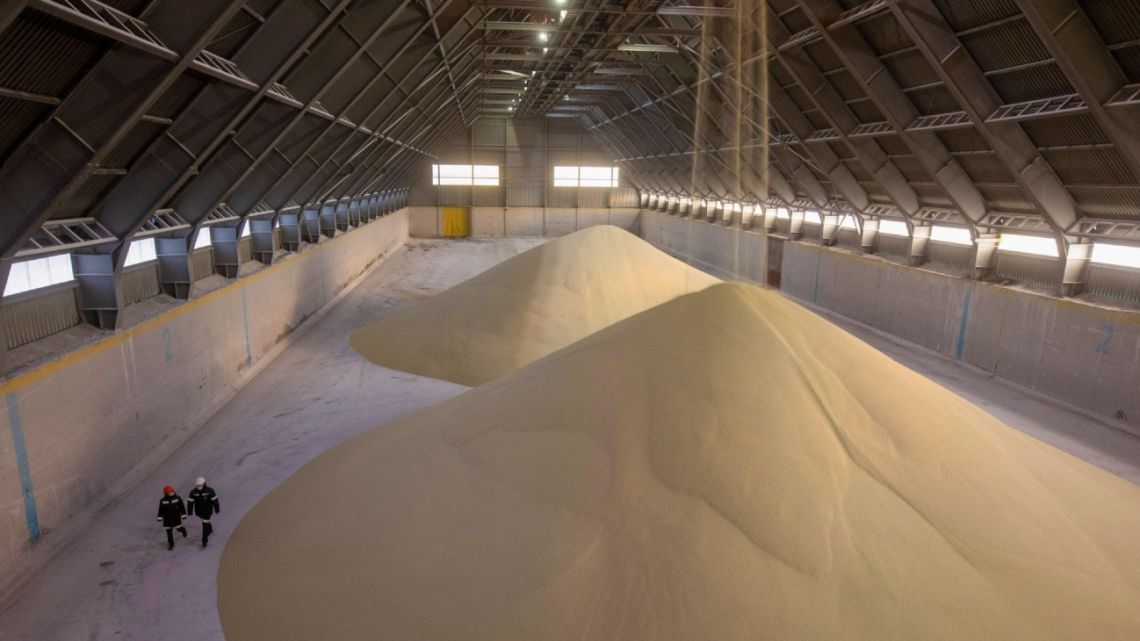 Piles of phosphate fertiliser granules in a storage warehouse at a fertilizer plant in Cherepovets, Russia. 