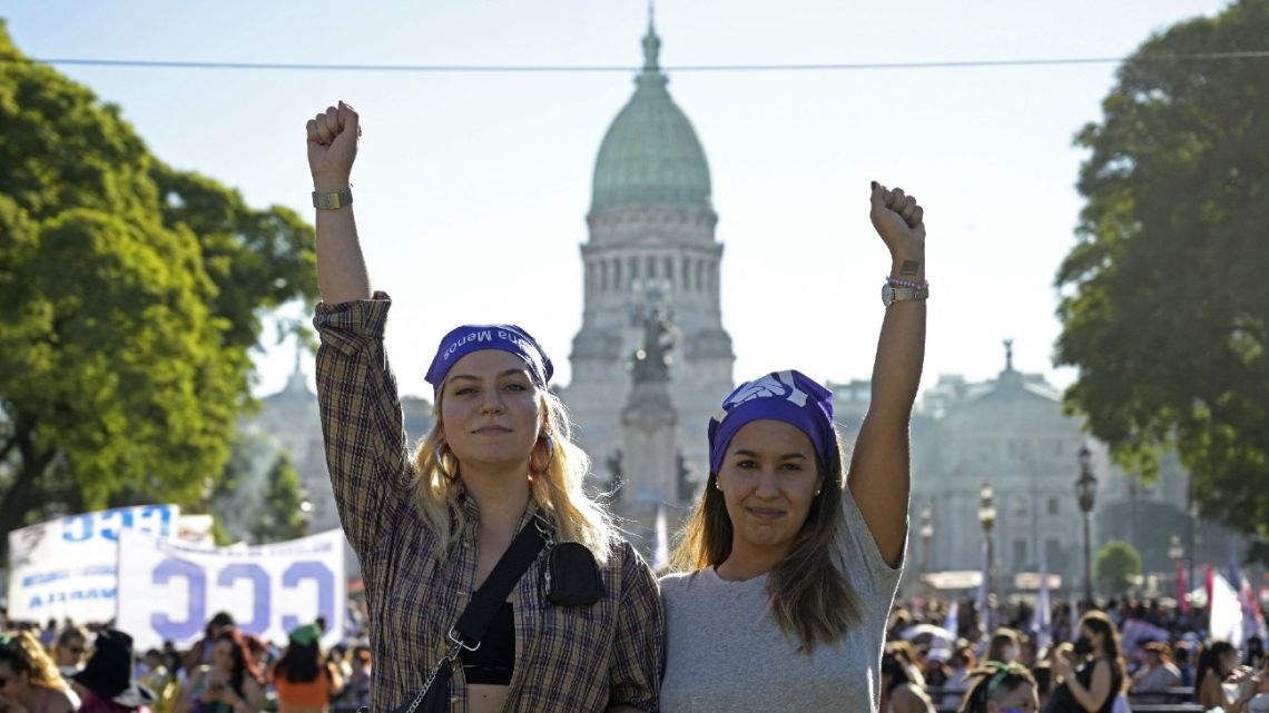 Women take part in a demonstration to mark the International Women's Day in Buenos Aires, on March 8, 2022. 