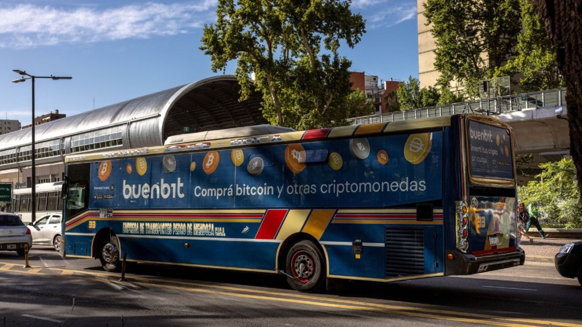 A bus with an advertisement for the Buenbit cryptocurrency exchange in Buenos Aires. 