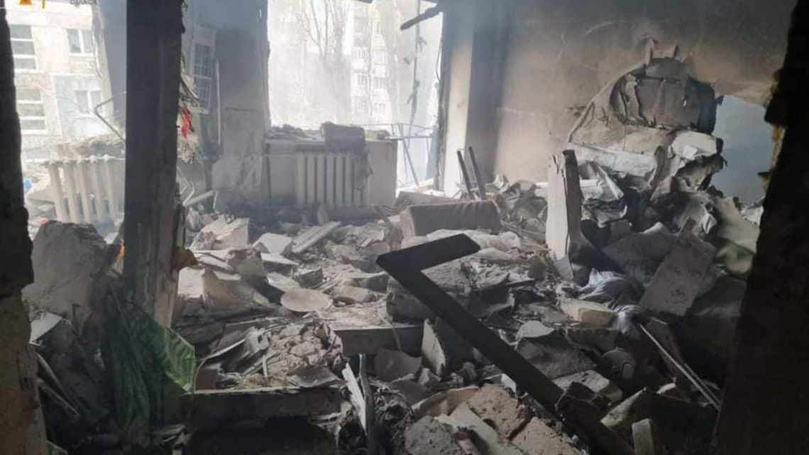 This handout picture taken and released by the Ukrainian State Emergency Service on March 7, 2022, shows a damaged residential building after Russian multiple rocket launchers BM-30 Smerch shelled the area in the southern city of Mykolaiv. Ukraine's military says it is fighting "fierce battles" with Russian forces on the edge of the southern city of Mykolaiv, which controls the road to the key Black Sea city of Odessa in the west.