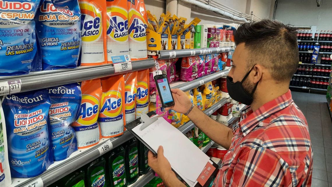 Price-checkers for the 'Precios Cuidados' price control scheme visit a supermarket in Buenos Aires Province.