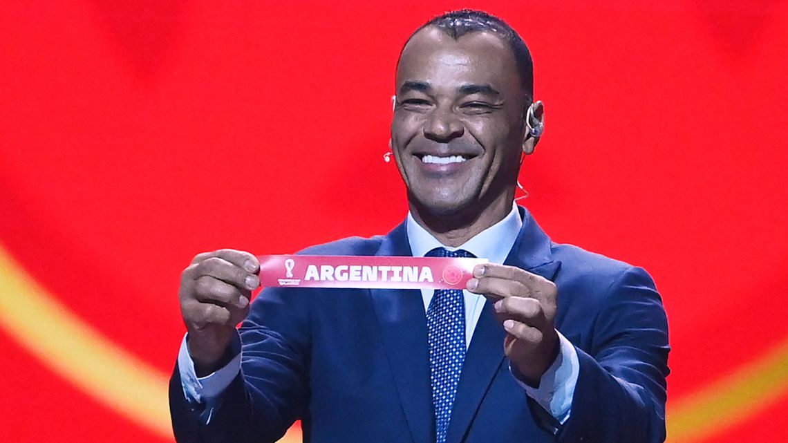 Former Brazilian footballer and World Cup winner Cafu displays the name of Argentina during the draw for the 2022 World Cup in Qatar at the Doha Exhibition and Convention Center on April 1, 2022. 