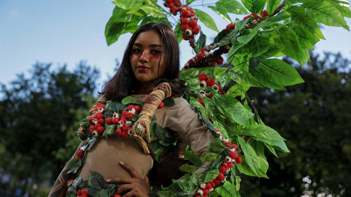 Indigenous woman Luana Melgueiro da Silva, of the Baré tribe, poses for a photo during a fashion event in Manaus, Amazonas state, Brazil, on April 9, 2022. The exhibition is the first in the country to rely entirely on indigenous stylists and models.