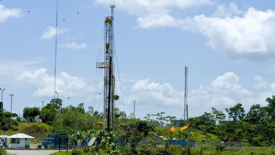 In this photo from October 2009, gas is flared off from an oil drilling rig near Yasuni National Park in Orellana Province, Ecuador.