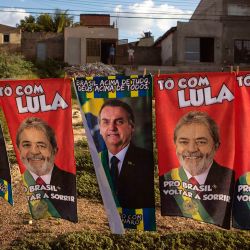 Matheus Silva sells towels featuring the two main candidates for the presidency near Salgueiro, Brazil, in February.