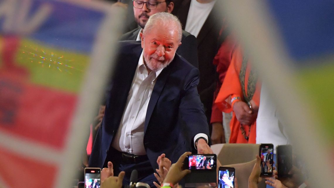 Former Brazilian president Luiz Inácio Lula da Silva greets supporters during the launch of his campaign for Brazil's October presidential election in São Paulo, Brazil, on May 7, 2022. 