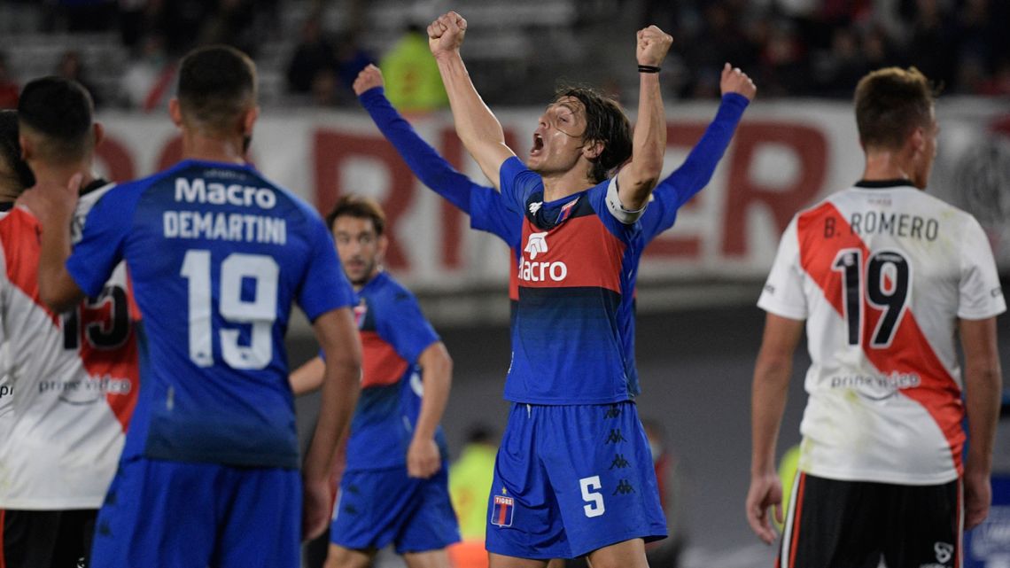 Tigre midfielder Sebastián Prediger (centre) celebrates after his side defeated River 2-1 in their Copa de la Liga Profesional quarter-final match at the Monumental stadium in Buenos Aires, on May 11, 2022. 