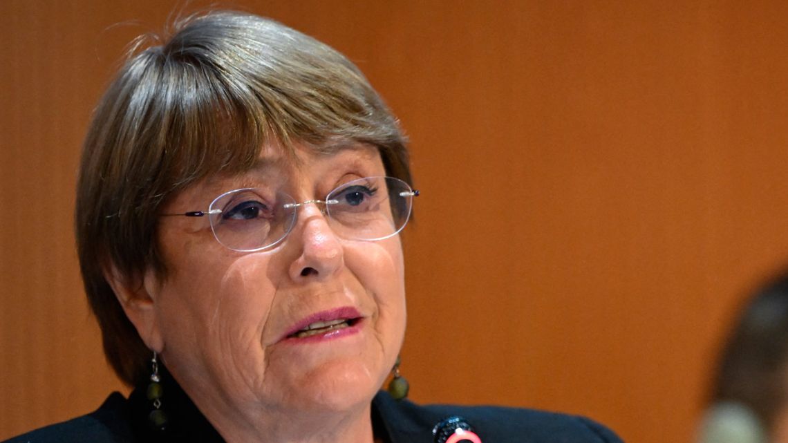 In this file photo taken on February 28, 2022, United Nations High Commissioner for Human Rights Michelle Bachelet delivers a speech at the opening of a session of the UN Human Rights Council in Geneva. 