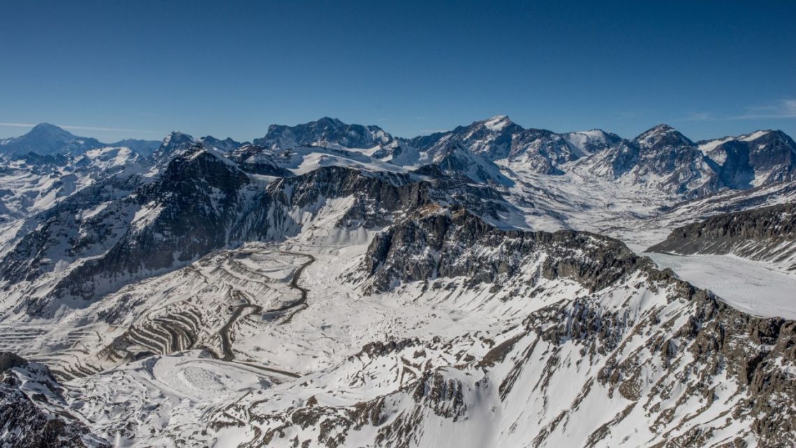 The Andina copper mine and Olivares Alfa glacier sit in the Andes Mountains in an aerial photograph taken near Santiago, Chile, on July 5, 2019. 