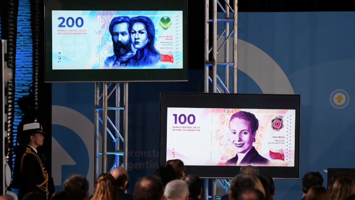 The new series of Argentine peso notes are displayed on screens during the presentation at the Bicentennial Museum of Casa Rosada House of Government in Buenos Aires on May 23, 2022.