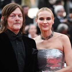 La actriz germano-estadounidense Diane Kruger y el actor estadounidense Norman Reedus llegan a la ceremonia de clausura de la 75ª edición del Festival de Cine de Cannes en Cannes, sur de Francia. | Foto:LOIC VENANCE / AFP