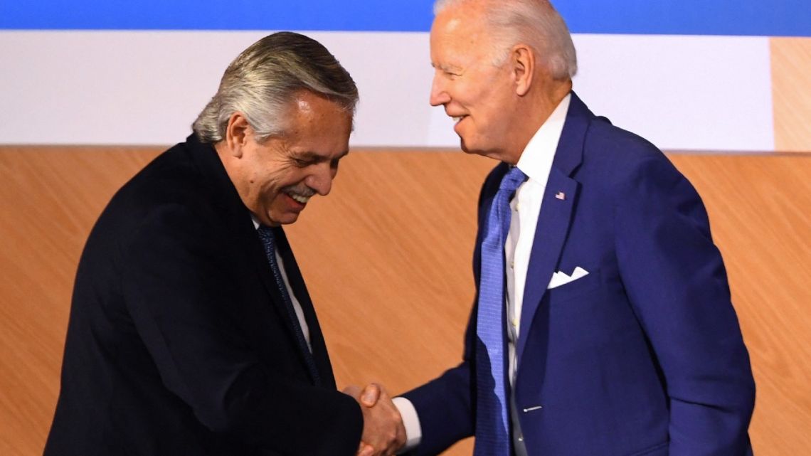 Argentina's Alberto Fernández (left) shakes hands with US President Joe Biden after speaking during a plenary session of the 9th Summit of the Americas in Los Angeles, California, June 9, 2022. 