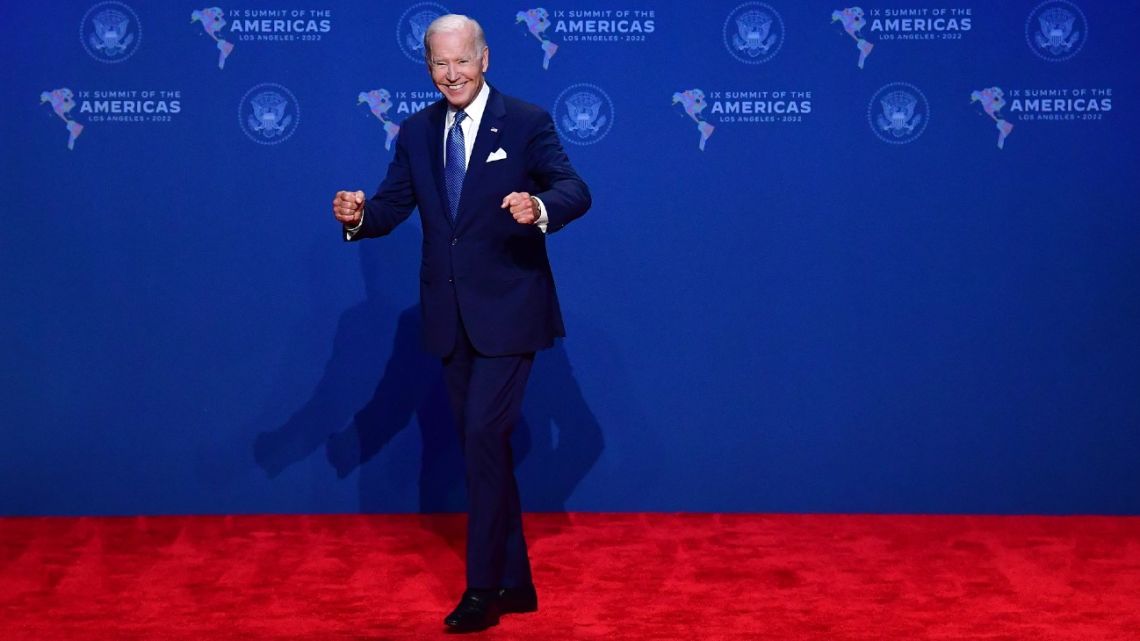 US President Joe Biden gestures after greeting attendees arriving for the Ninth Summit of the Americas at the Los Angeles Convention Center in Los Angeles, California on June 8, 2022. 