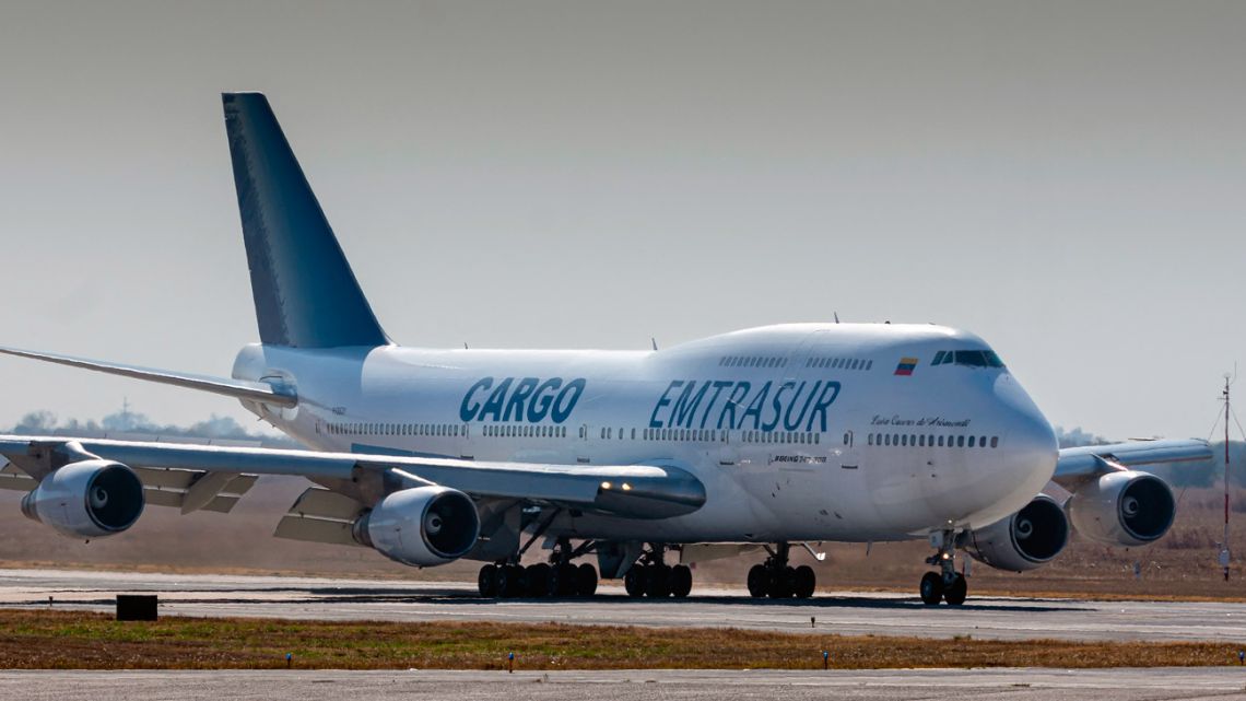 View of the Boeing 747-300 registrered number YV3531 of Venezuelan Emtrasur cargo airline at the international airport in Cordoba, Argentina, on June 6, 2022, before taking off for Buenos Aires. A plane transporting automotive components, 14 Venezuelan crew members and five Iranians, is being held at the Ezeiza airport in Buenos Aires, after raising suspicion on the motives of its flight to Argentina, official sources informed AFP on June 12, 2022. 