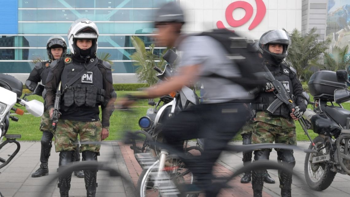 Colombian soldiers stand guard on a street in Bogota, on June 17, 2022, ahead of the weekend's presidential runoff election. Colombians head to the polls on June 19 for a run-off to choose their new president, either leftist former guerrilla Gustavo Petro or eccentric millionaire construction mogul Rodolfo Hernández.