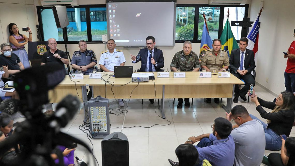 Eduardo Alexandre Fontes (C), Regional Superintendent of Amazonas State Federal Police, talks during a press conference regarding a missing reporter and indigenous expert in the Amazon rainforest, in Manaus, Brazil, on June 8, 2022.