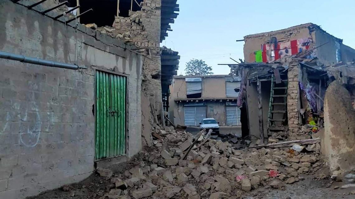This photograph taken on June 22, 2022 and received as a courtesy from @Alham24992157 / ESN, Bakhtar News Agency, shows damaged buildings following an earthquake in Gayan district, Paktika Province, Afghanistan. A powerful earthquake struck a remote border region of Afghanistan overnight killing at least 920 people and injuring hundreds more, officials said on June 22, with the toll expected to rise as rescuers dig through collapsed dwellings. 