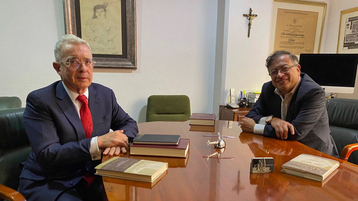 Handout picture released by Gustavo Petro's Press Office shows the Colombian president-elect (right) meeting with ex-president Álvaro Uribe (2002–2010) in Bogotá on June 29, 2022. 
