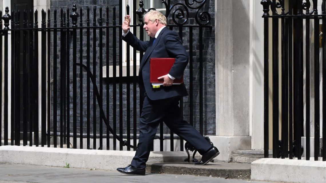 Britain's Prime Minister Boris Johnson leaves from 10 Downing Street in central London on July 6, 2022 to head to the Houses of Parliament for the weekly Prime Minister's Questions (PMQs) session. UK Prime Minister Boris Johnson suffered two shock departures from his government Tuesday, including his finance minister, as civil war erupted in the high command of the ruling Conservative party.
