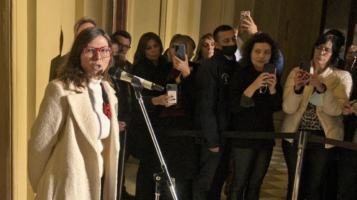 Economy Minister Silvina Batakis talks to the press after her swearing-in ceremony at the Casa Rosada in Buenos Aires on July 4, 2022.