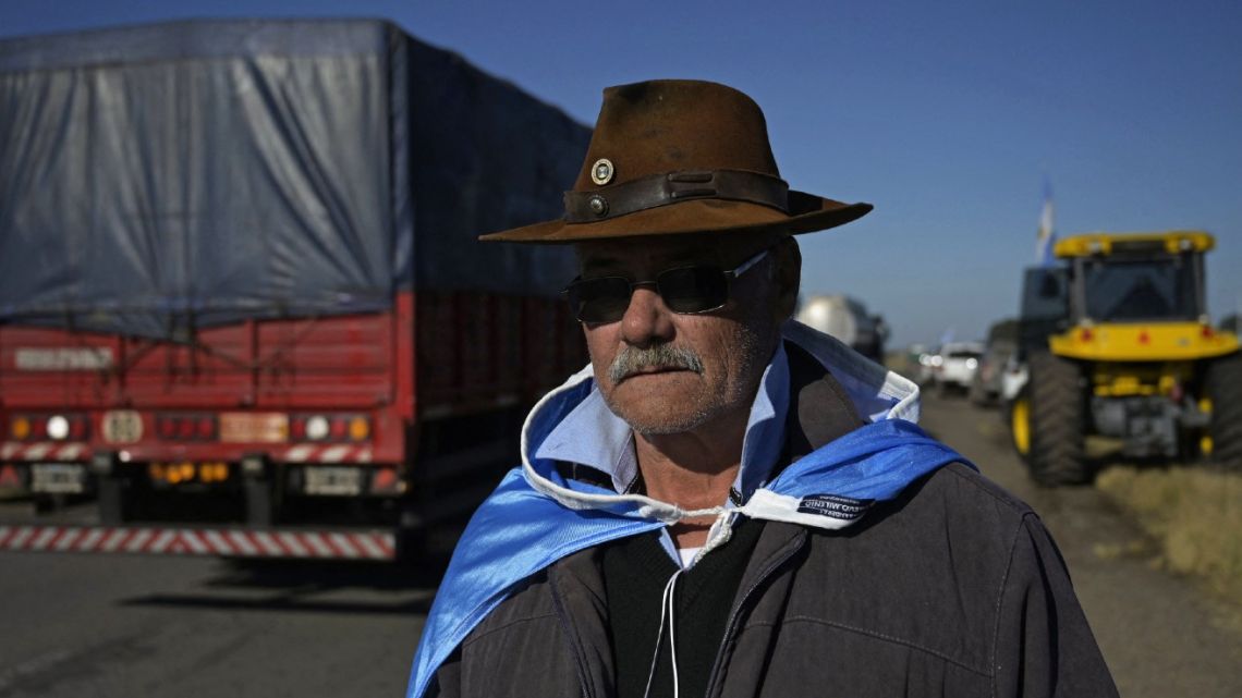 An agricultural producer stands on Ruta Nacional 14 during a demonstration against the government of President Alberto Fernández in Gualeguaychú, on July 13, 2022. 