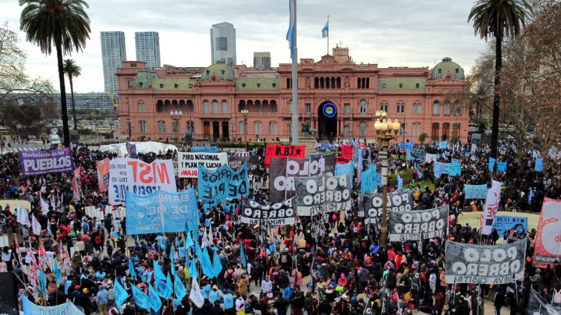 Members of social organisations protests on July 14, 2022, in Plaza de Mayo square in front of Casa Rosada in Buenos Aires, to demand that the government expand social plans and take urgent action against high inflation. 
