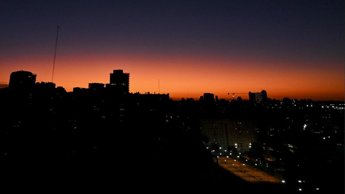 The sun sets over Buenos Aires, on July 13, 2022.