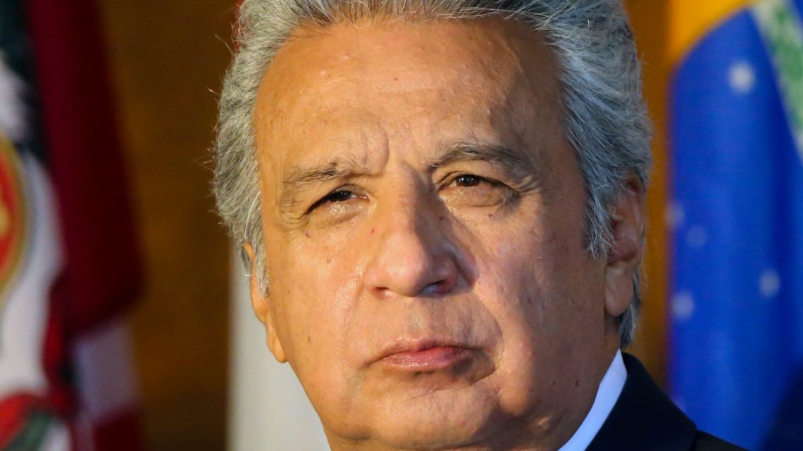 (FILES) In this file photo taken on May 5, 2021, Ecuador's President Lenin Moreno listens during Inter-American Institute for Democracy Forum "Defence of Democracy in the Americas" in Miami, Florida. The Ecuadoran public prosecutor's office said on July 25, 2022, it is investigating former president Lenin Moreno over the disappearance of priceless artifacts from the presidential palace. The public prosecutor's office said on Twitter it was searching Moreno's home "in the context of an investigation into the alleged crime of embezzlement related to the alleged disappearance of heritage pieces" from the government building.