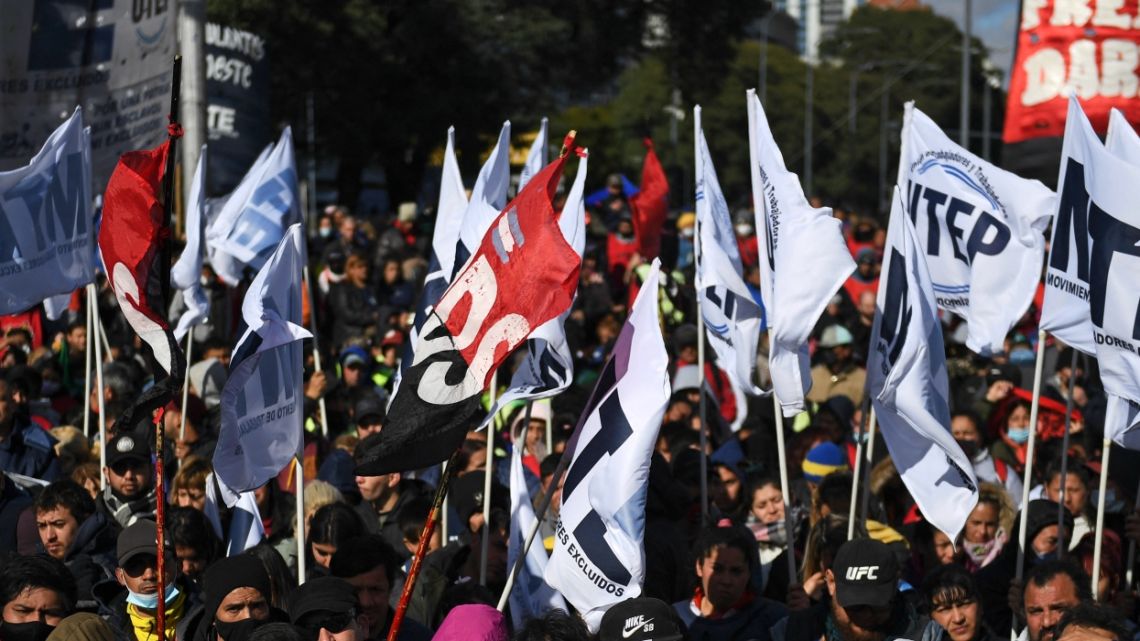 Members of social organizations march to Plaza de Mayo square demanding a universal basic salary and social aid amid the growing inflation in Buenos Aires, on July 28, 2022.