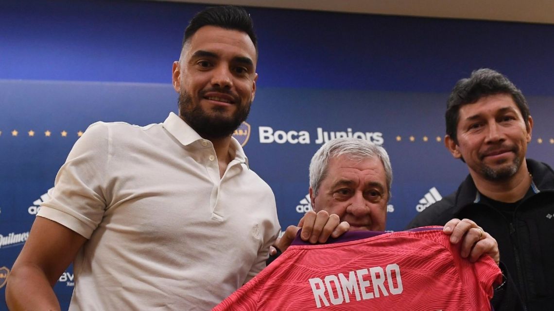 Sergio Romero signs for Boca Juniors.