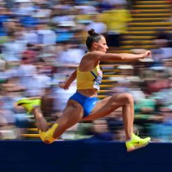 La ucraniana Maryna Bekh-Romanchuk compite en la clasificación de triple salto femenino durante el Campeonato Europeo de Atletismo en el Estadio Olímpico de Múnich, en el sur de Alemania. ANDREJ ISAKOVIC / AFP. | Foto:AFP