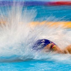 Arvid Farro, de Aruba, compite en las eliminatorias de los 100 metros libres masculinos en el 8º Campeonato Mundial Juvenil de Natación de la FINA en Lima. | Foto:Ernesto Benavides / AFP