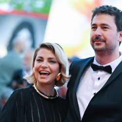 Director Santiago Mitre and his partner Dolores Fonzi arrive on September 3, 2022 for the screening of the film at the Venice film festival.