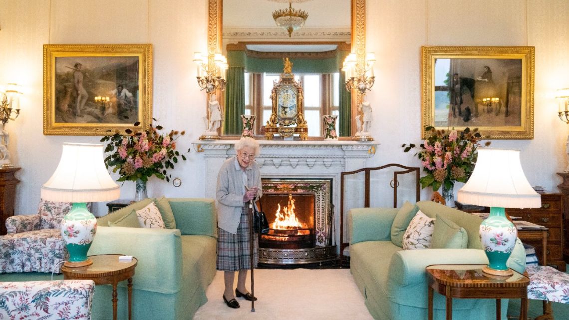In this file photo taken on September 6, 2022 Britain's Queen Elizabeth II waits to meet with new Conservative Party leader and Britain's Prime Minister-elect at Balmoral Castle in Ballater, Scotland. 