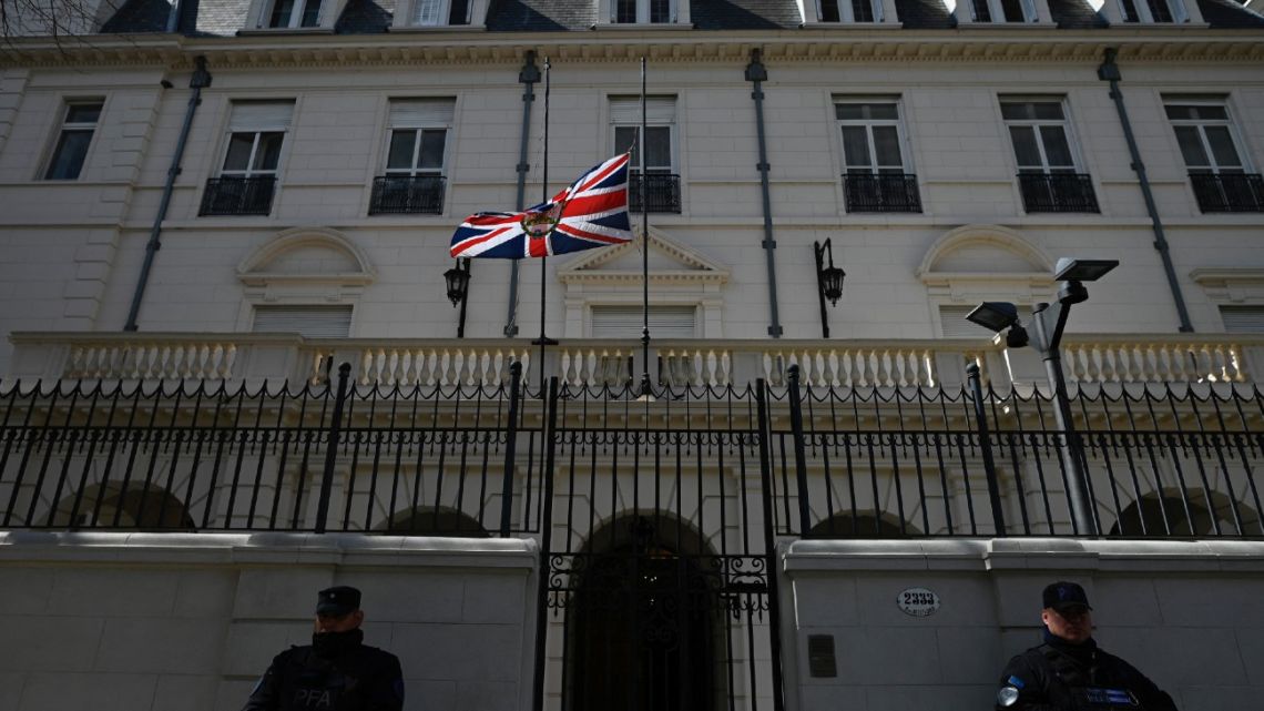 The UK's Union Jack flag is seen at half mast in honour of the late Queen Elizabeth II, at the house of the British ambassador in Buenos Aires, Argentina on September 9, 2022. Queen Elizabeth II, the longest-serving monarch in British history and an icon instantly recognisable to billions of people around the world, died at her Scottish Highland retreat on September 8 at the age of 96. L