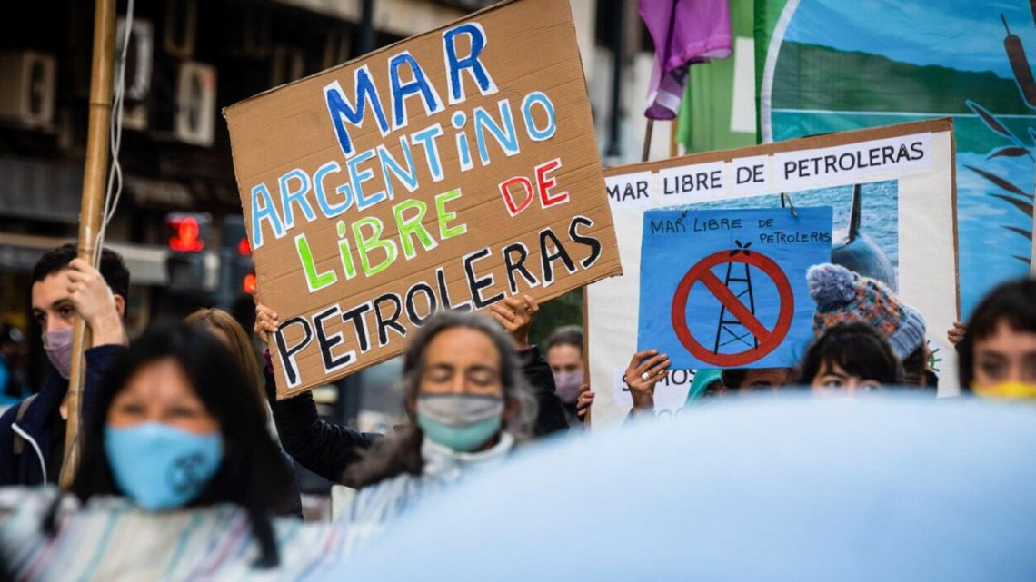 Protestors hold placards calling for an 'Argentine Sea free from oil companies' at a march in Buenos Aires. Argentina's government has in recent years awarded tenders to 13 companies to explore for offshore oil.