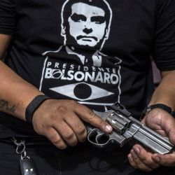 Partidario de Bolsonaro armado.  | Foto:Bloomberg