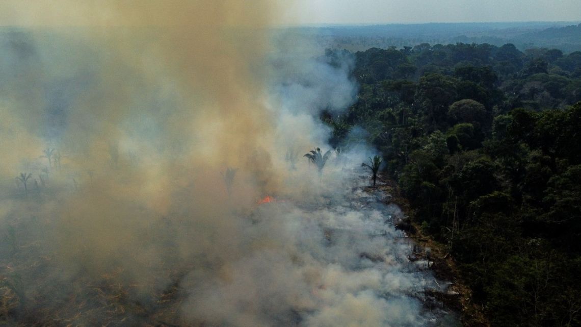 Aerial view of a burnt are of the Amazonia rainforest in Apui, southern Amazonas State, Brazil, on September 21, 2022.