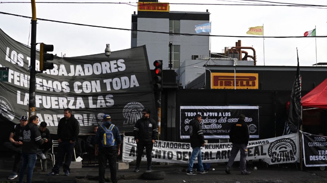 Workers hold a demonstration outside the Pirelli tyre factory in Merlo, Buenos Aires Province, on September 29, 2022. 