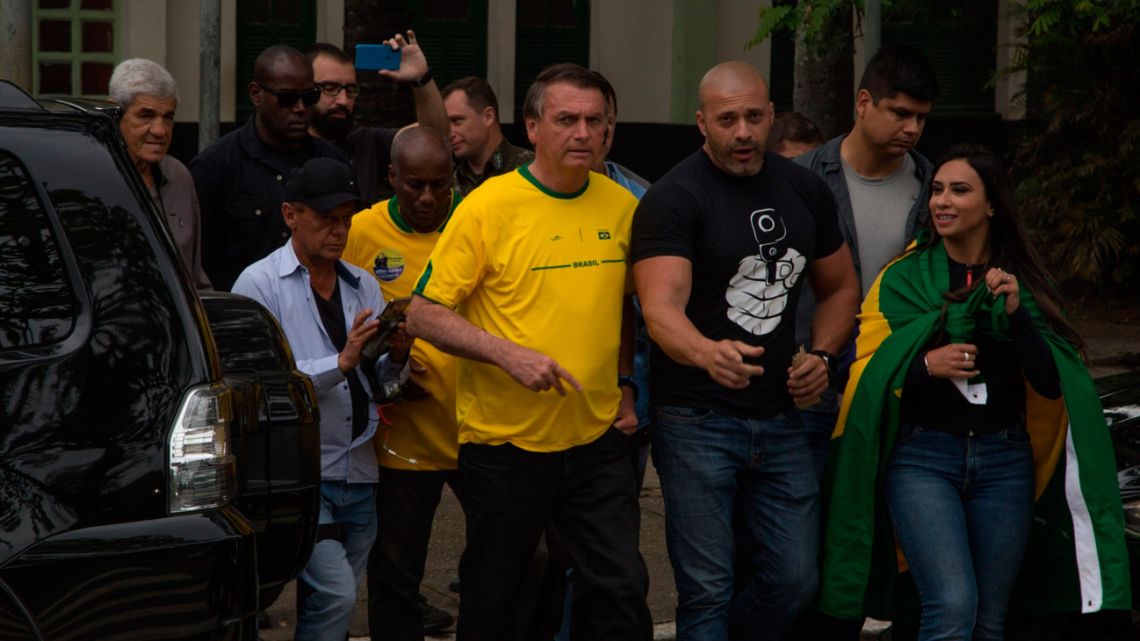 Brazil President Jair Bolsonaro, pictured on election day with members of his inner circle.