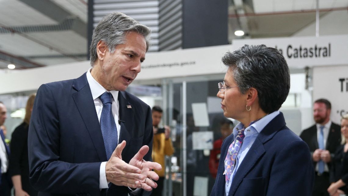 US Secretary of State Antony Blinken speaks with Mayor of Bogota Claudia Lopez during his visit to the Migration Integration Center in Bogota on October 4, 2022.